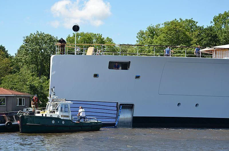 a boat docked at a pier aboard 818 Yacht for Sale