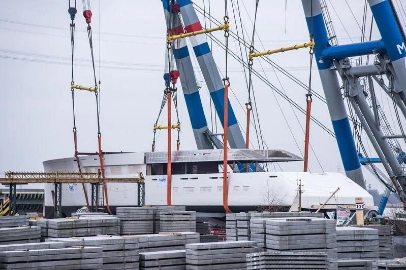 a boat docked in a harbor aboard 818 Yacht for Sale