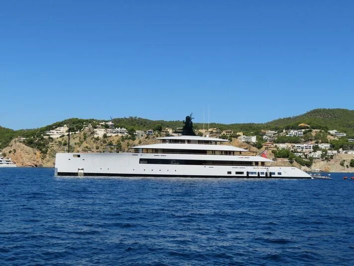 a large white boat on the water aboard 818 Yacht for Sale