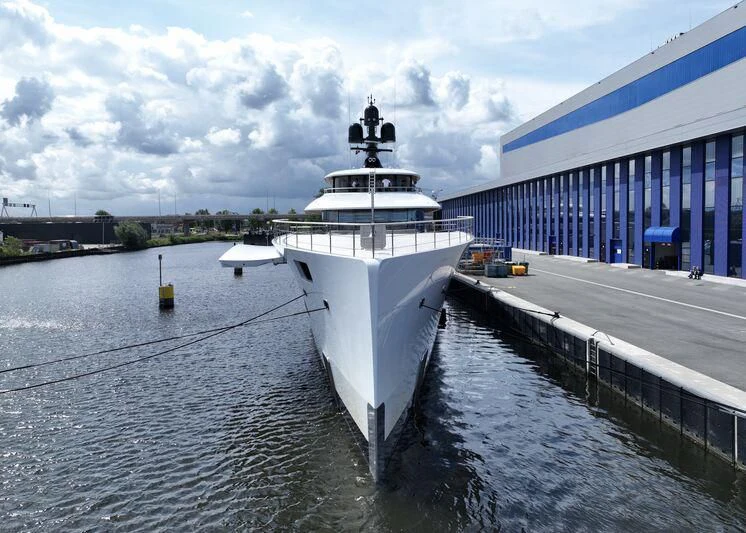 a large ship in the water aboard 818 Yacht for Sale