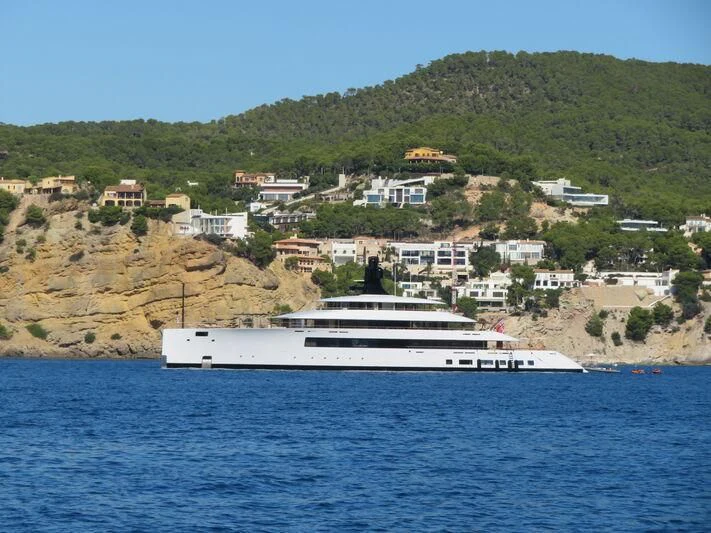 a large white boat on the water aboard 818 Yacht for Sale
