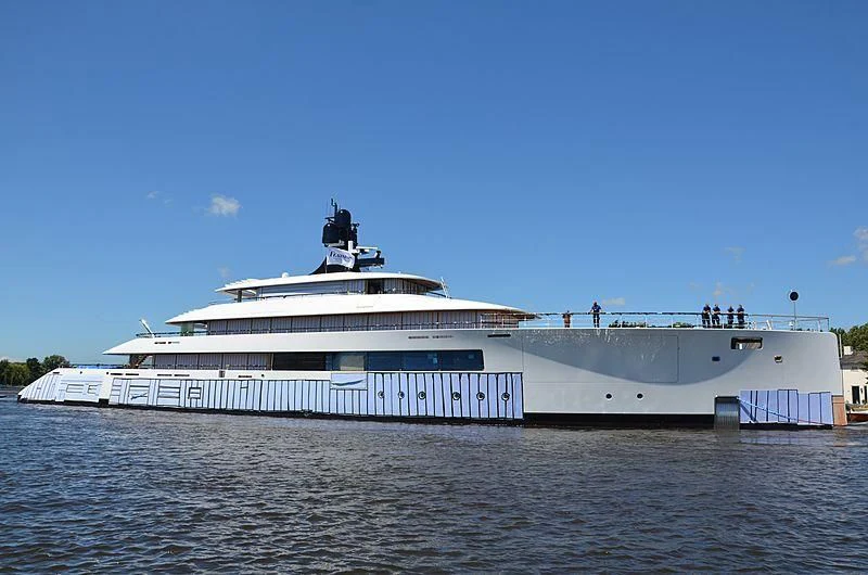 a large white boat on the water aboard 818 Yacht for Sale