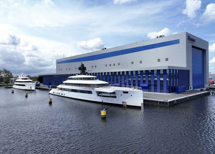 a large cruise ship docked aboard 818 Yacht for Sale