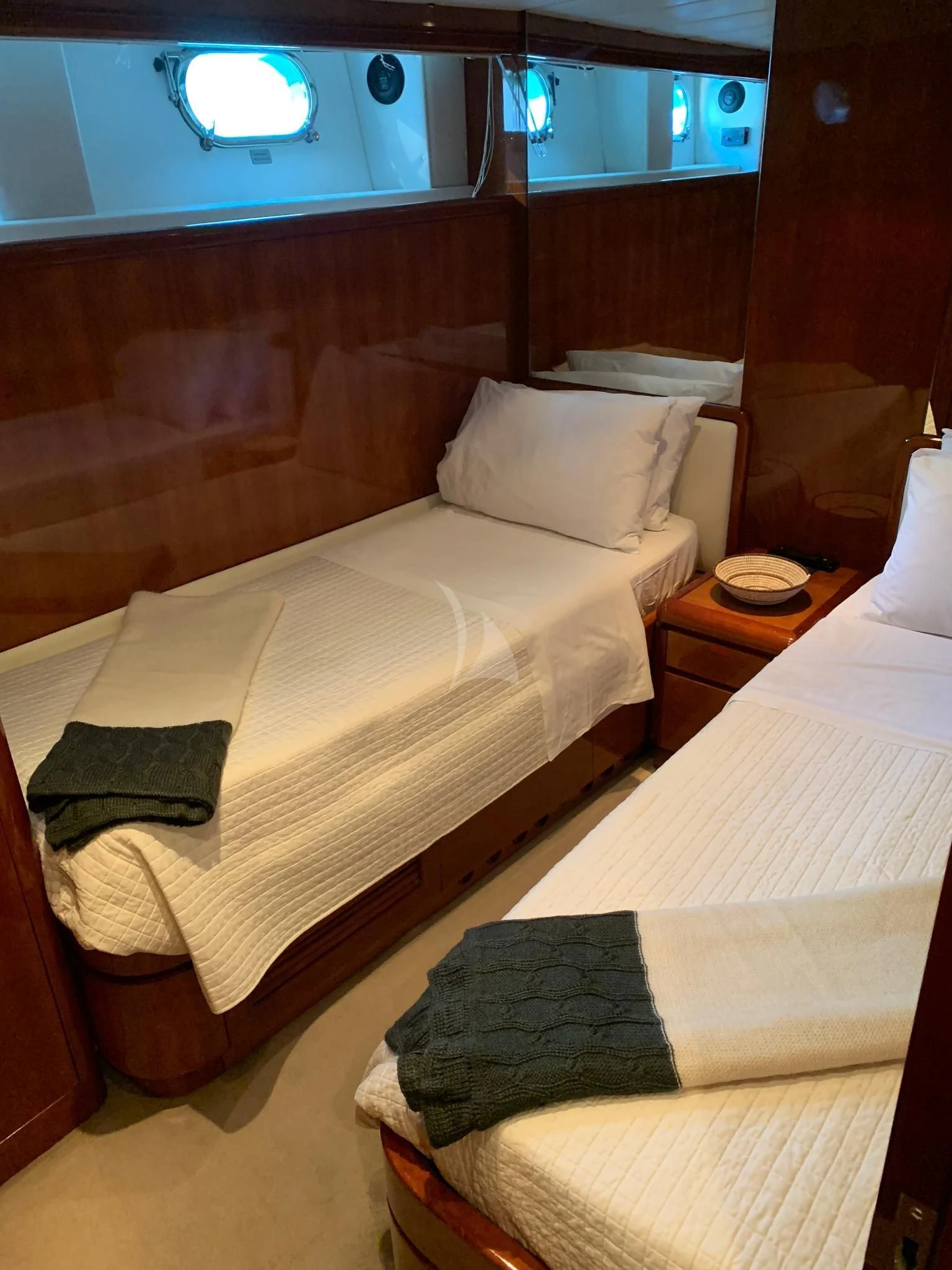 a room with two beds aboard MOONRAKER II Yacht for Sale