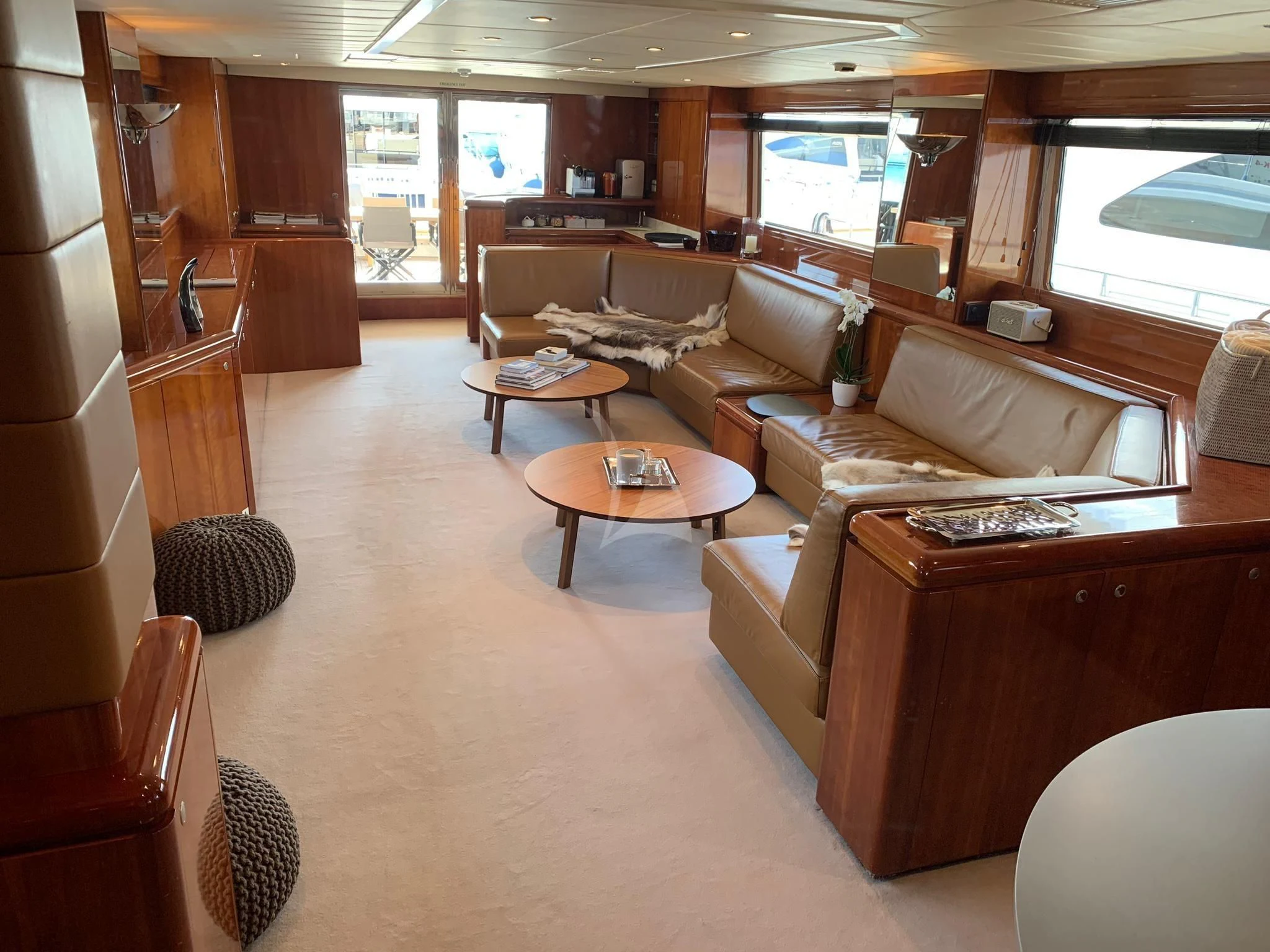a living room with a couch and a table aboard MOONRAKER II Yacht for Sale