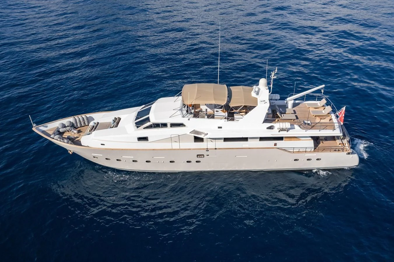 a white yacht in the water aboard MOONRAKER II Yacht for Sale
