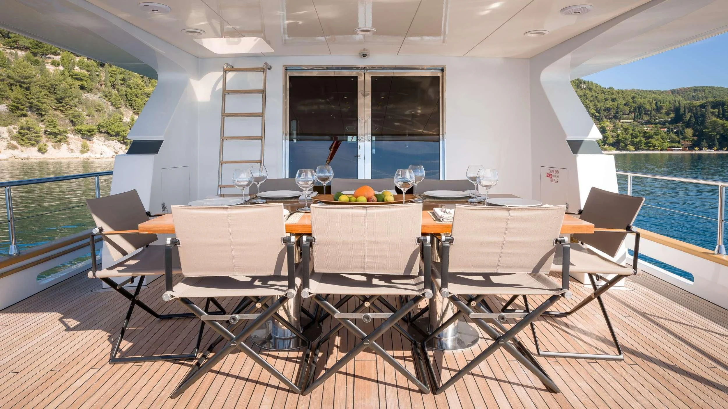 a table set for a meal aboard MOONRAKER II Yacht for Sale