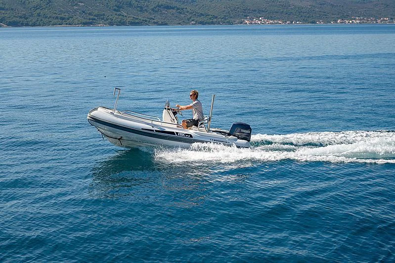 a man on a boat aboard MOONRAKER II Yacht for Sale