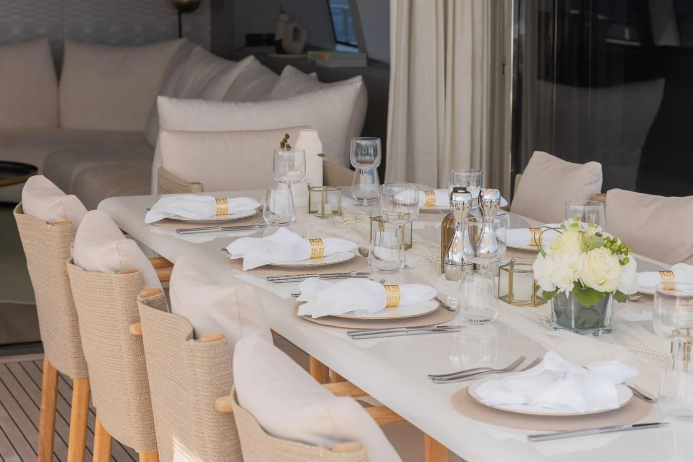 a table set with place settings aboard FAMILIA Yacht for Sale