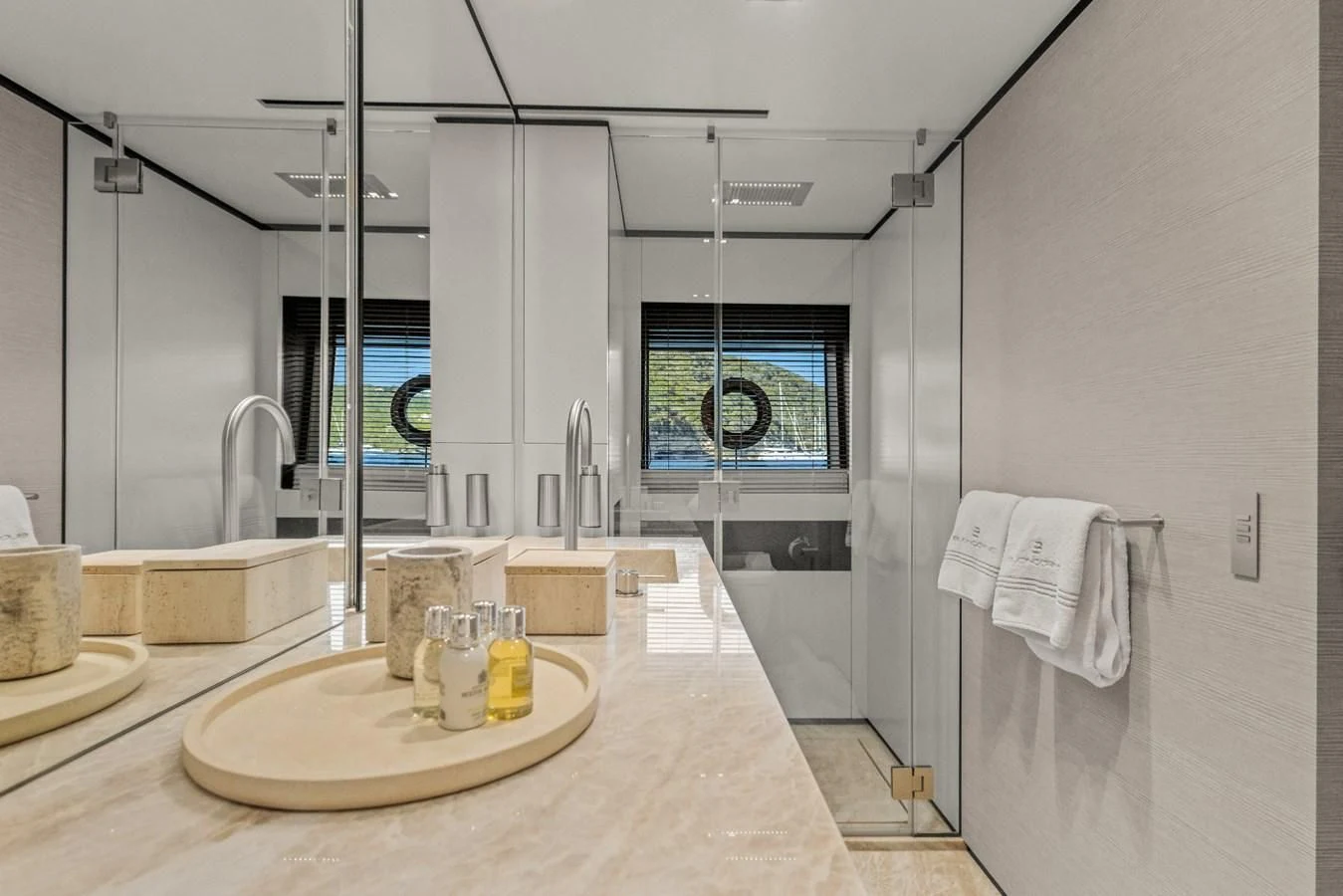 a bathroom with a sink and a mirror aboard FAMILIA Yacht for Sale