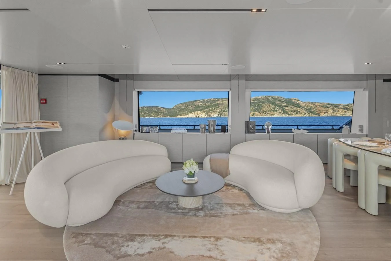 a modern looking living room aboard FAMILIA Yacht for Sale