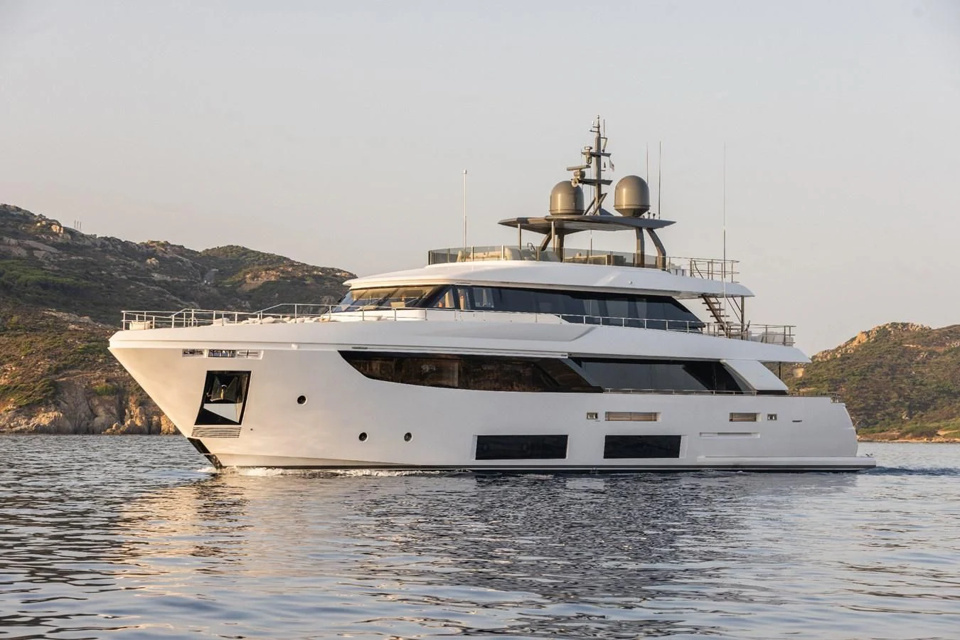 a white yacht on the water aboard FAMILIA Yacht for Sale