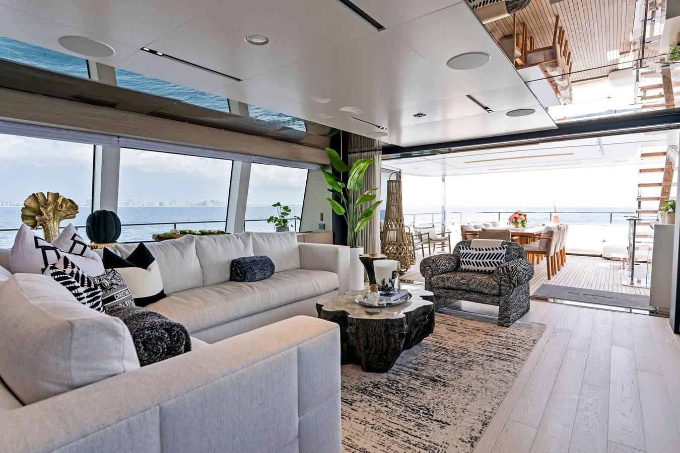 a living room with a large window aboard FAMILIA Yacht for Sale