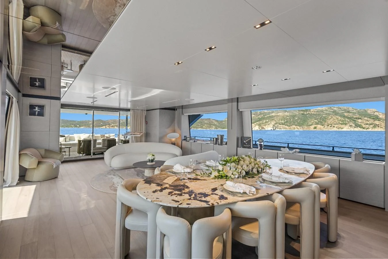 a dining table in a kitchen aboard FAMILIA Yacht for Sale