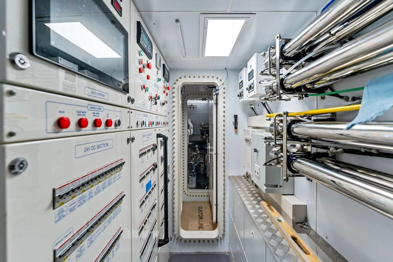 a room with white machines aboard FAMILIA Yacht for Sale