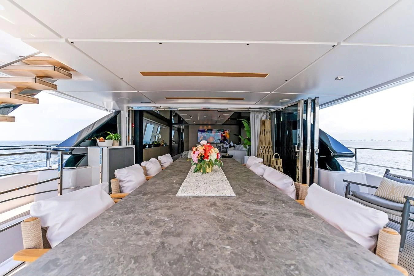 a large room with a large bed aboard FAMILIA Yacht for Sale