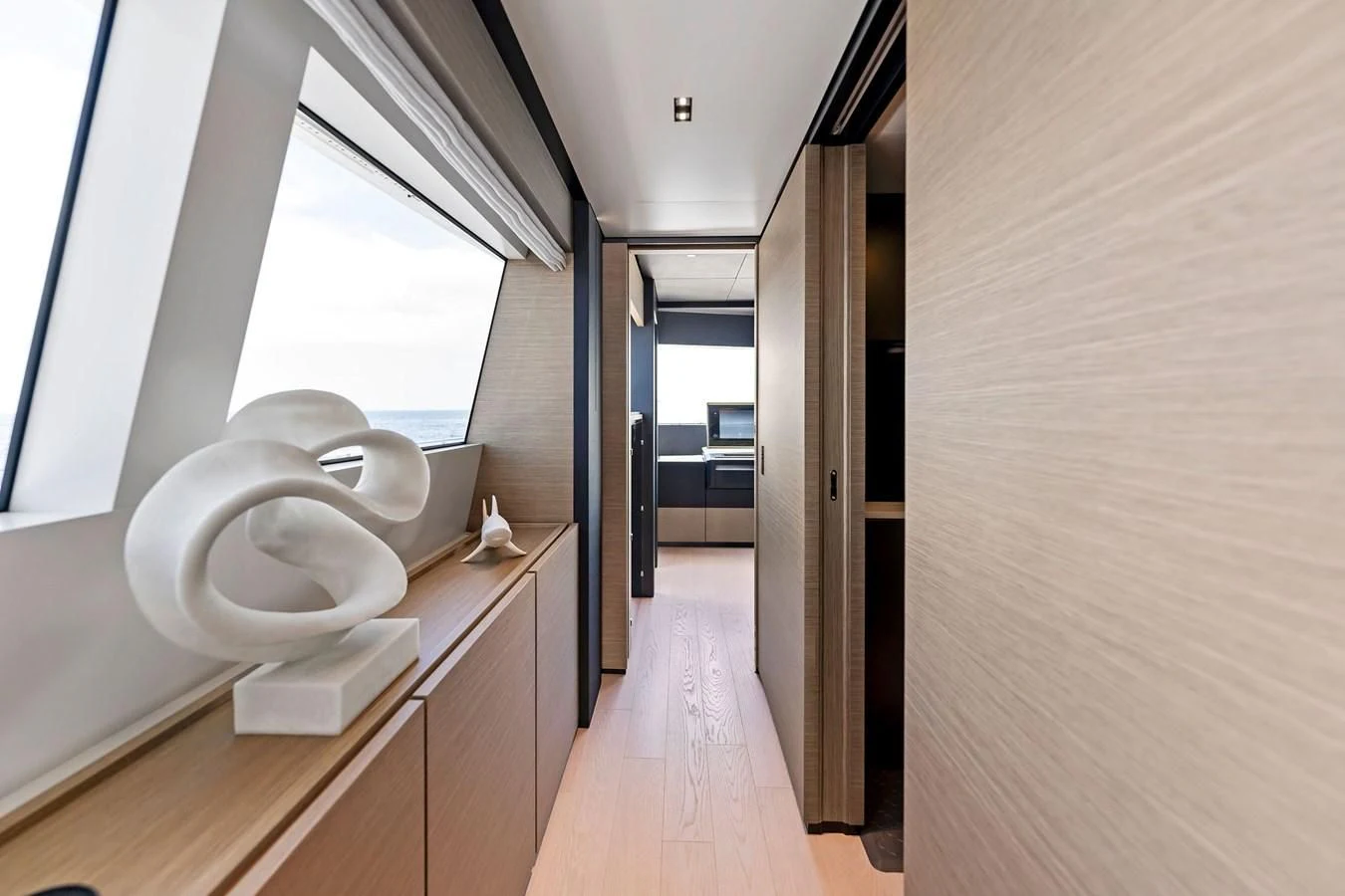 a room with a large mirror aboard FAMILIA Yacht for Sale