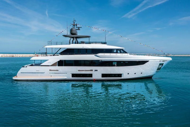 a white yacht in the water aboard FAMILIA Yacht for Sale