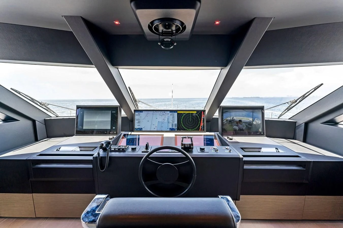 a room with a desk and computer aboard FAMILIA Yacht for Sale