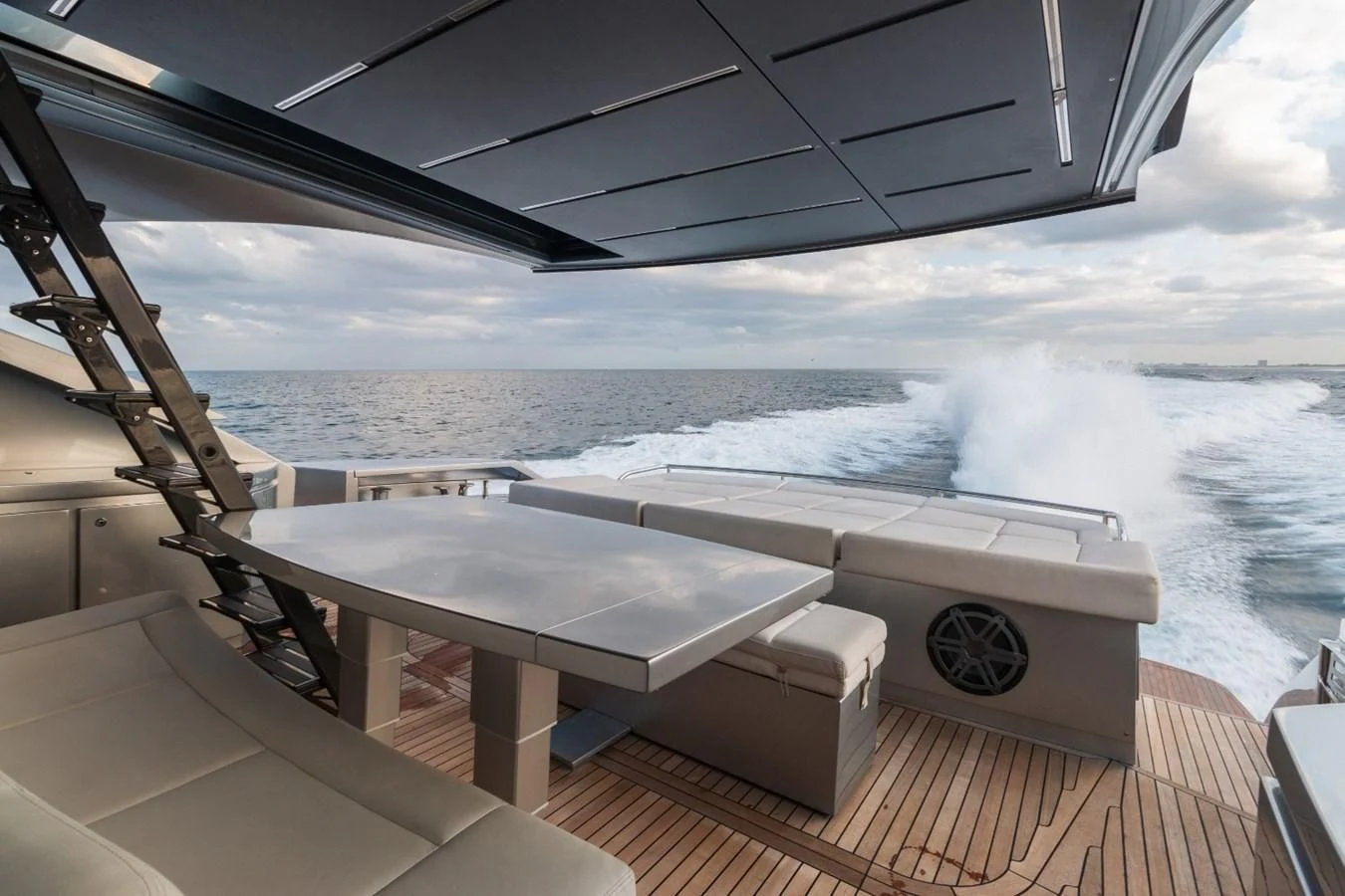 a room with a table and chairs aboard SUGAR Yacht for Sale