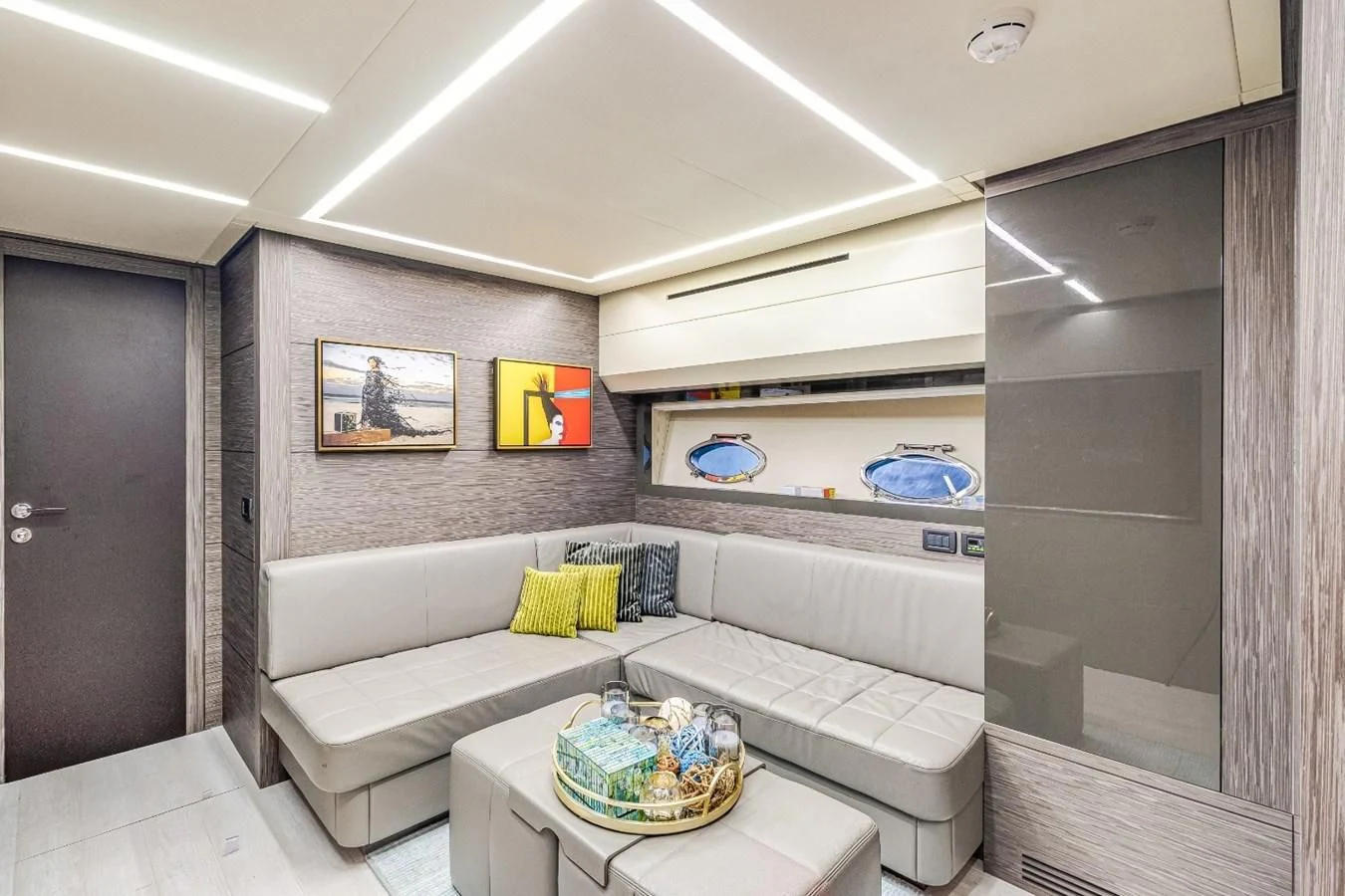 a room with a couch and a table aboard SUGAR Yacht for Sale
