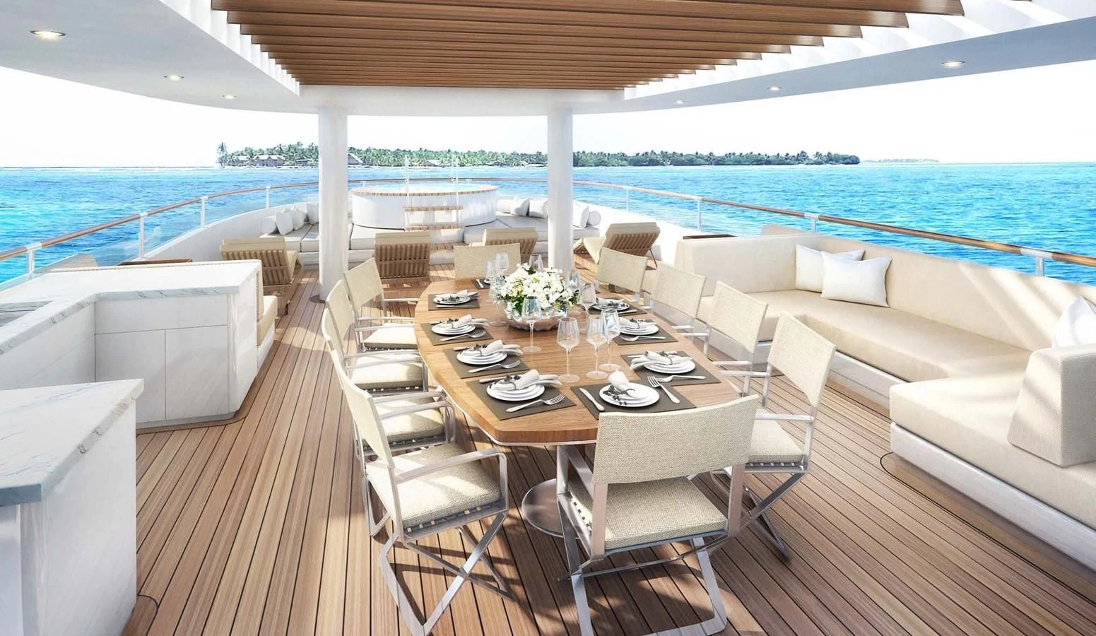 a table and chairs on a deck aboard GOLDEN ORCHID Yacht for Sale