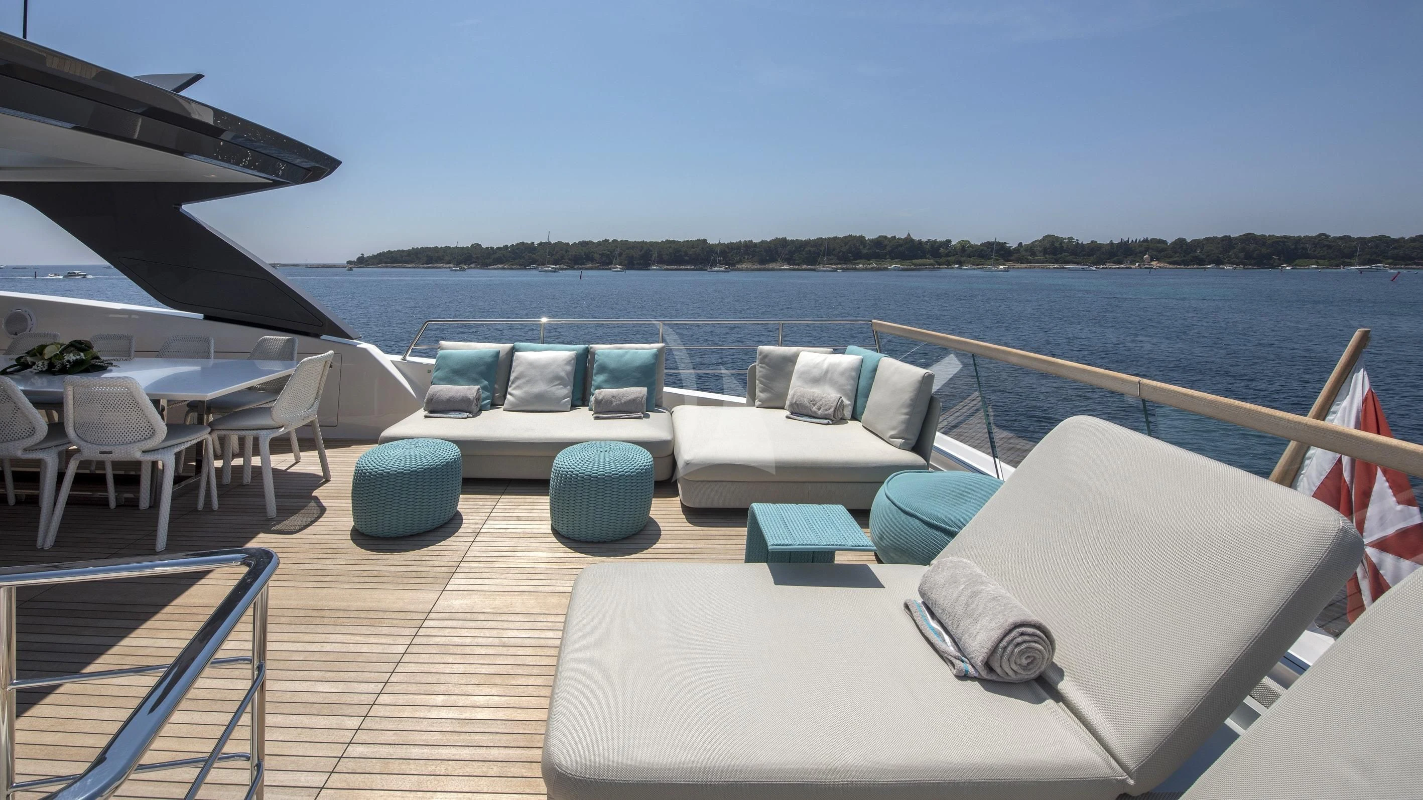 a deck with chairs and tables on it aboard DE ZEUS Yacht for Sale