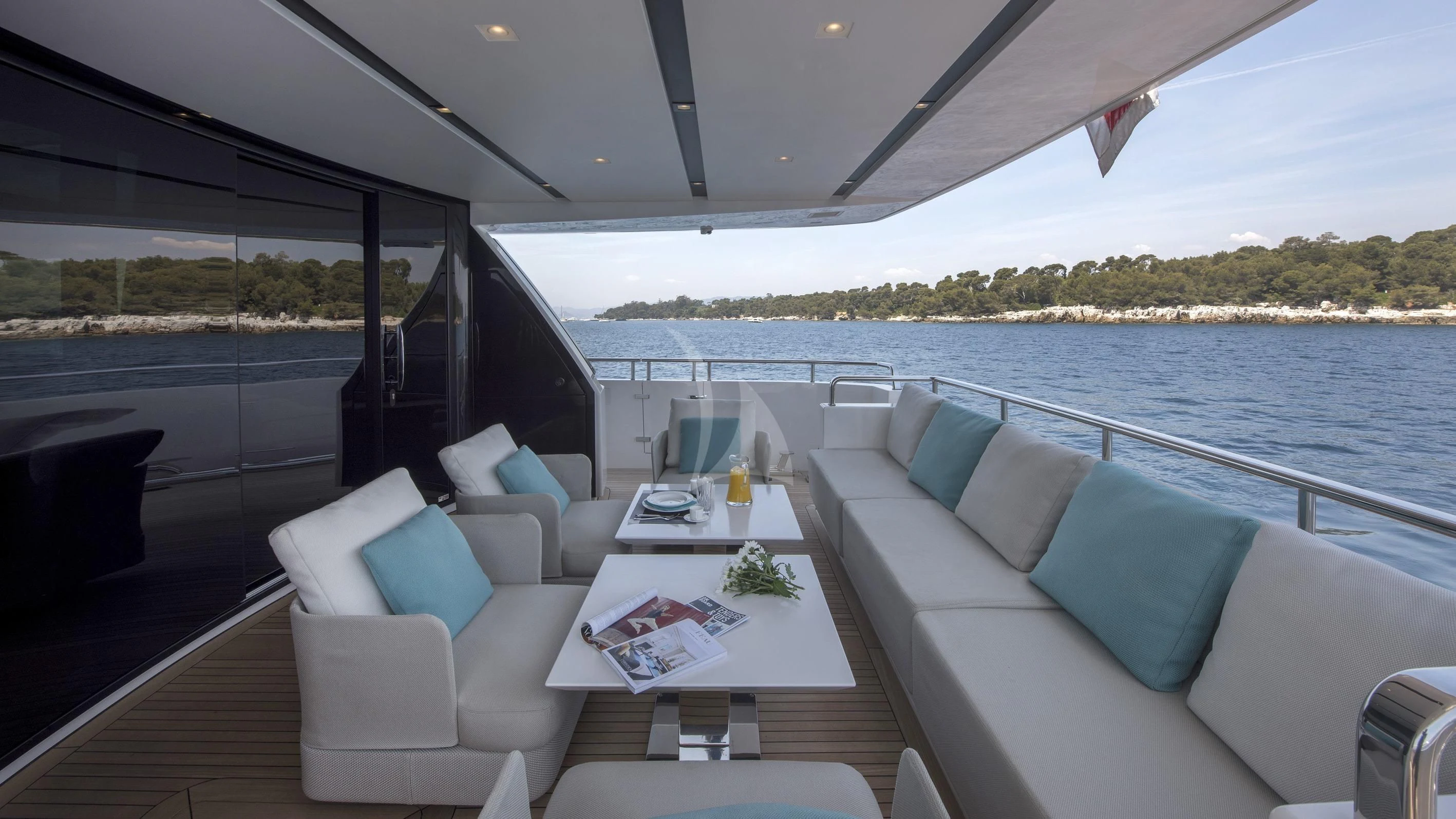 a boat with a table and chairs aboard DE ZEUS Yacht for Sale