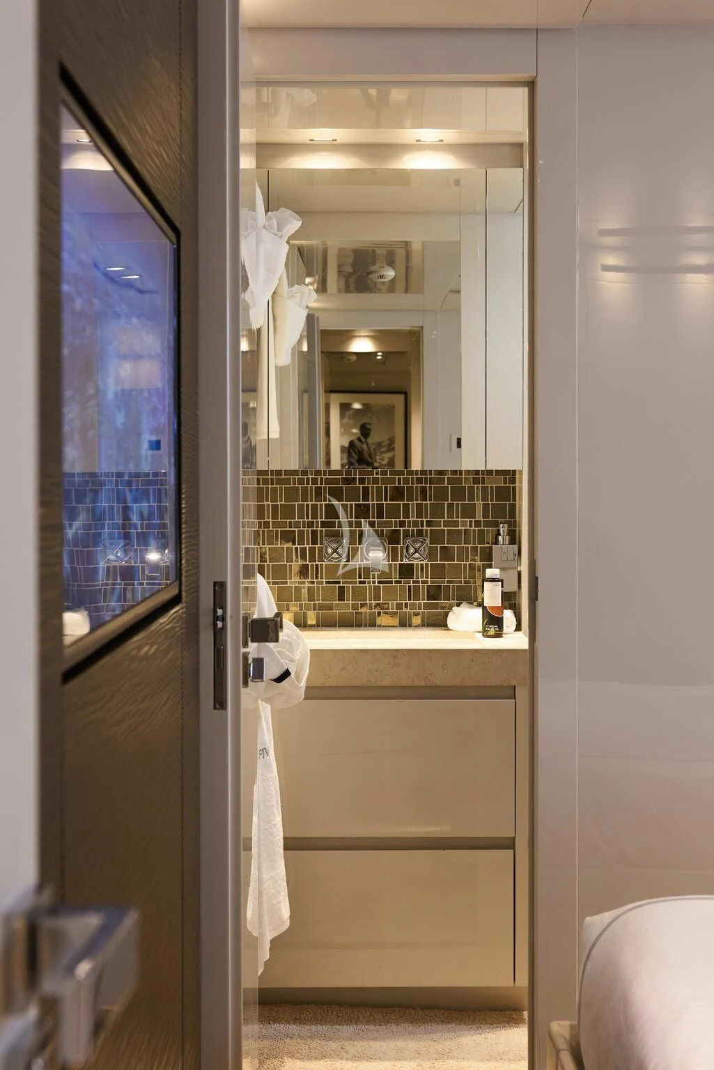 a bathroom with a sink and a mirror aboard DE ZEUS Yacht for Sale