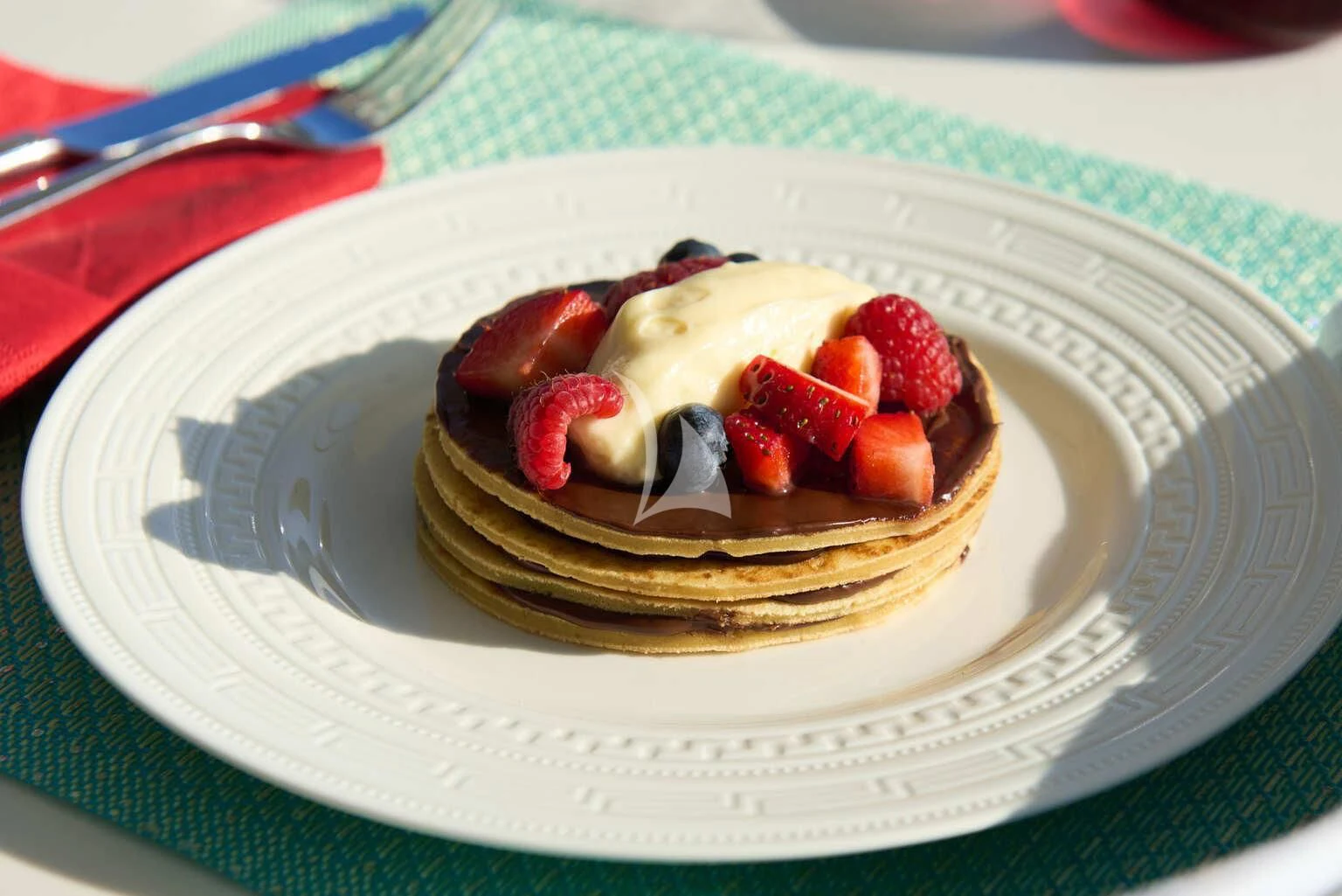 a dessert on a plate aboard DE ZEUS Yacht for Sale