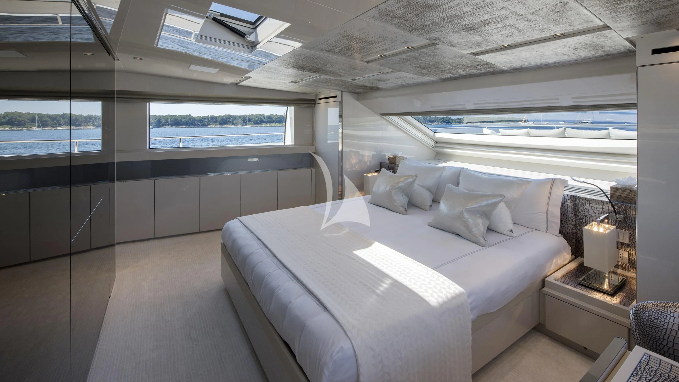 a room with a bed and a window aboard DE ZEUS Yacht for Sale