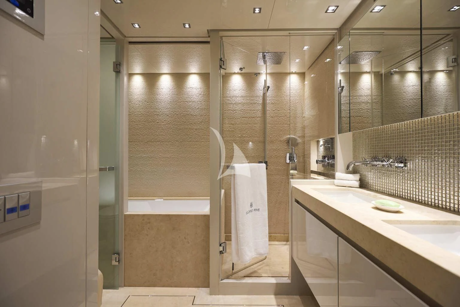 a bathroom with a glass shower aboard DE ZEUS Yacht for Sale