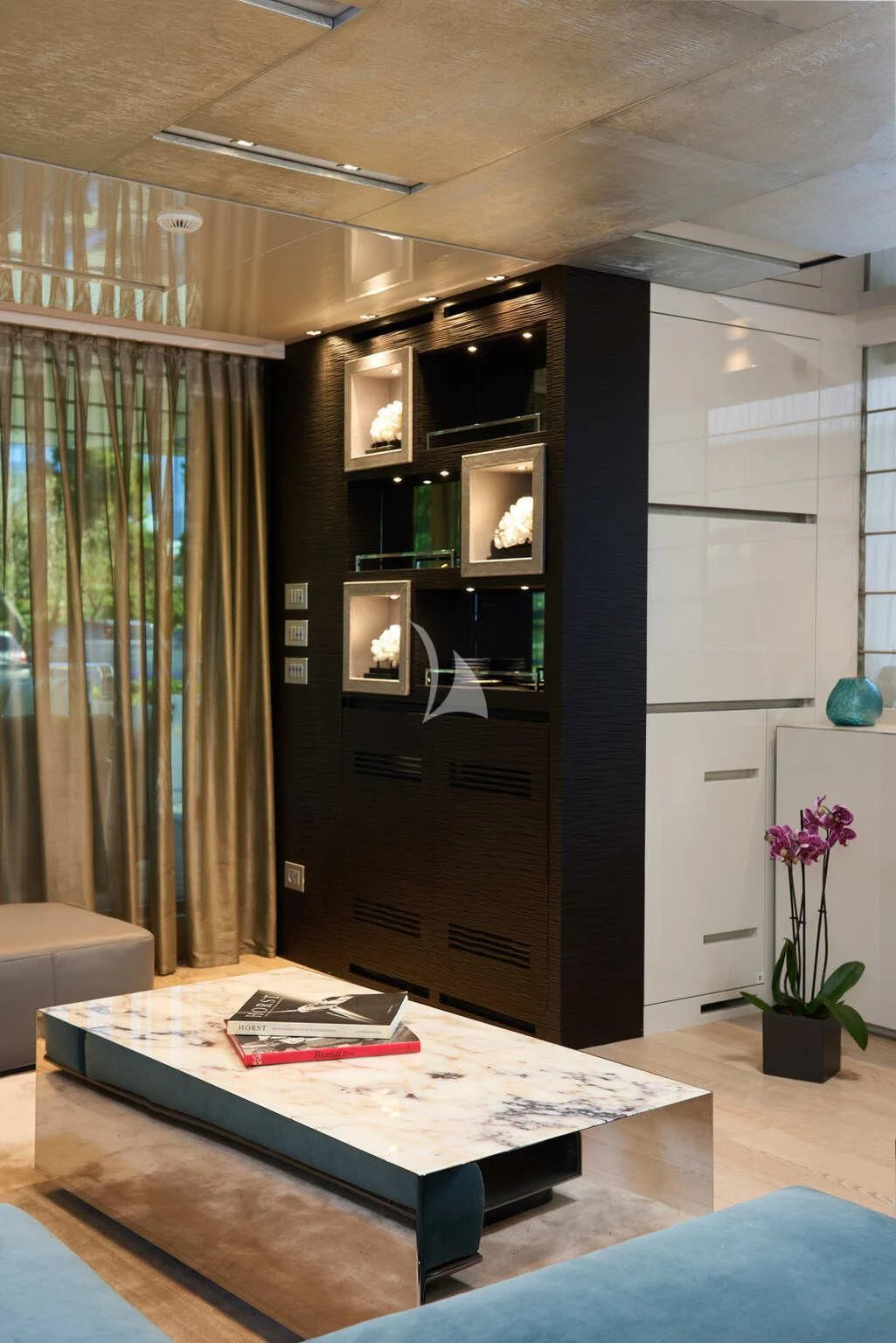 a room with a table and a tv aboard DE ZEUS Yacht for Sale