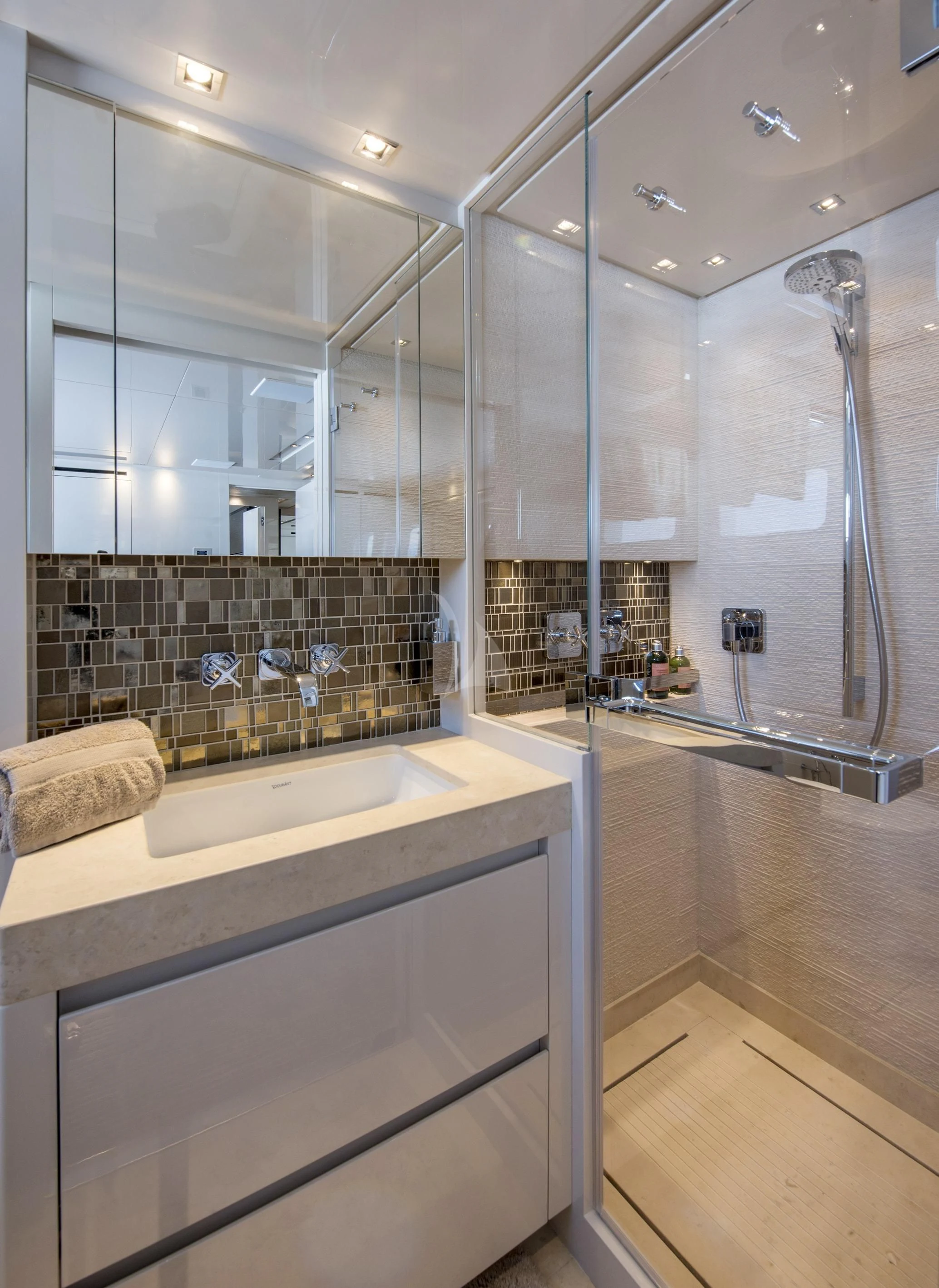 a bathroom with a glass shower aboard DE ZEUS Yacht for Sale