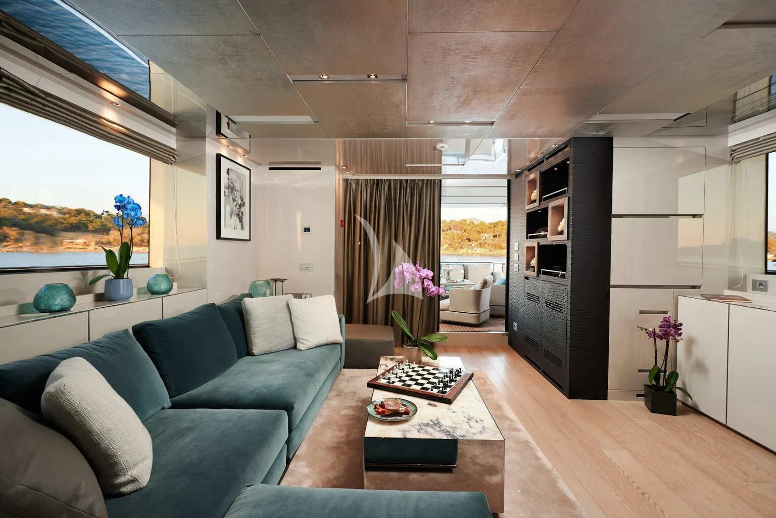 a living room with a couch and a table aboard DE ZEUS Yacht for Sale