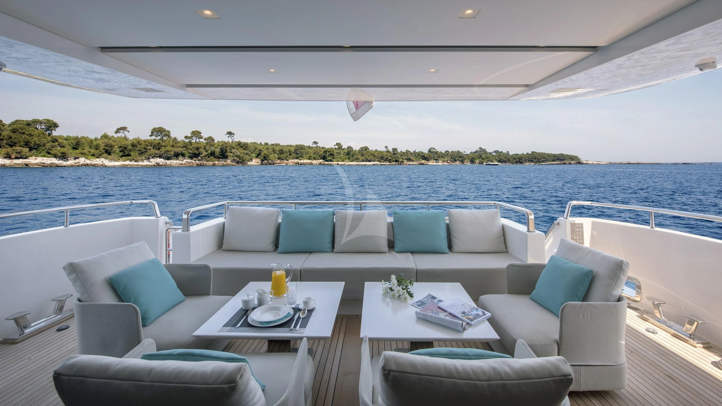 a large white lounge chair on a boat in the water aboard DE ZEUS Yacht for Sale