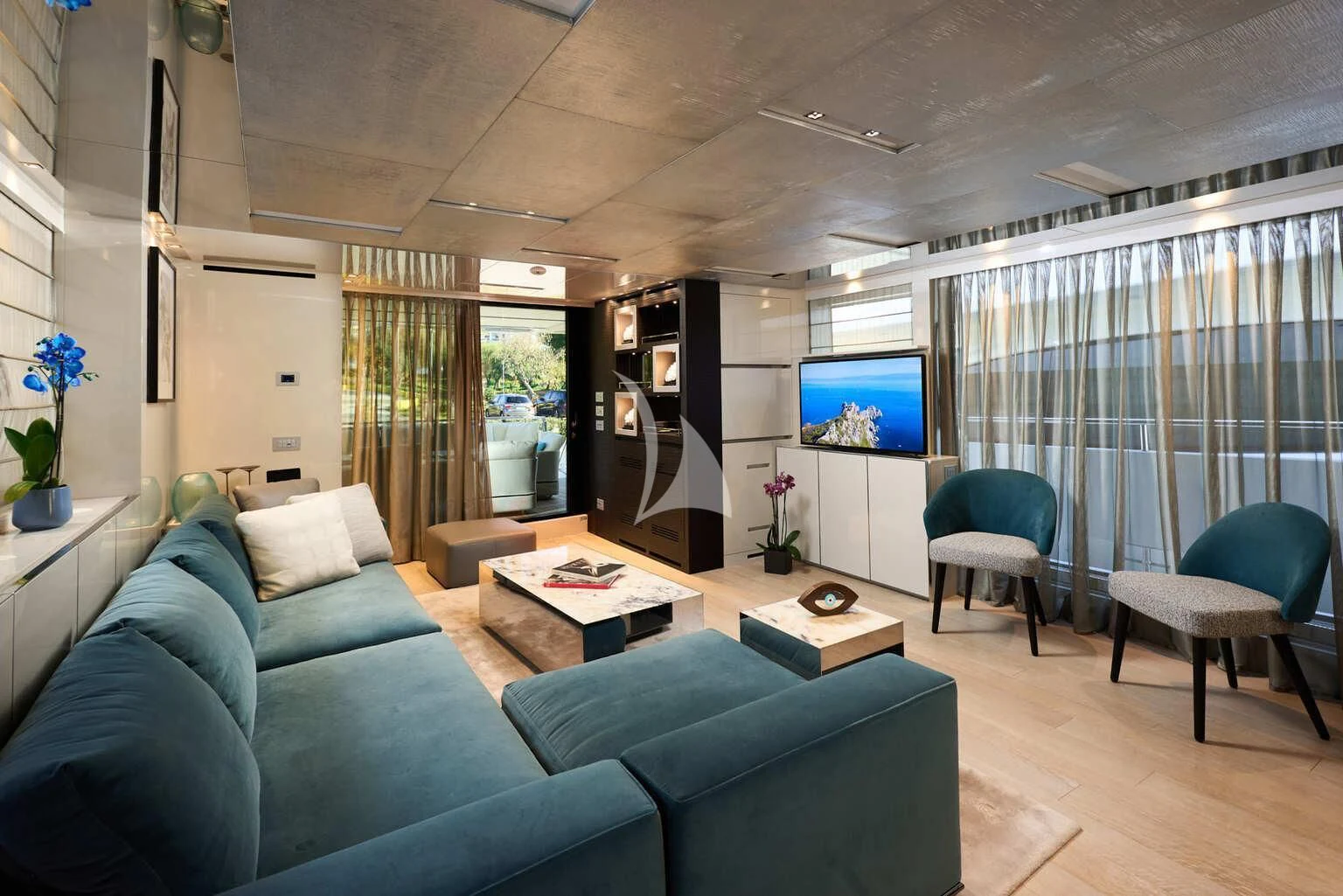 a living room with a large window aboard DE ZEUS Yacht for Sale