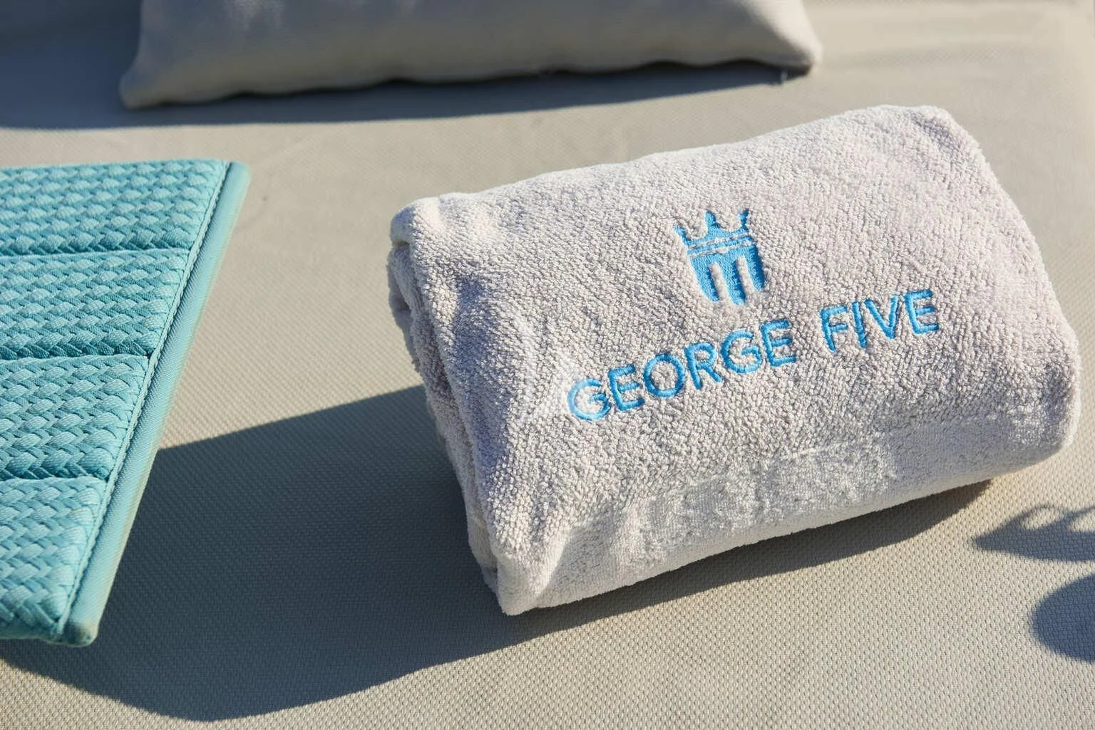 a blue and white cap aboard DE ZEUS Yacht for Sale