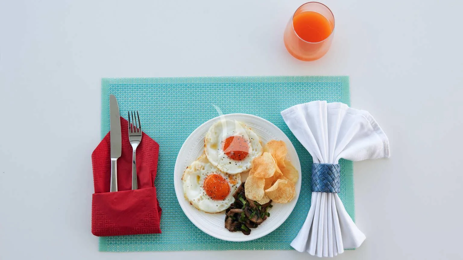 a plate of food and a cup of tea aboard DE ZEUS Yacht for Sale