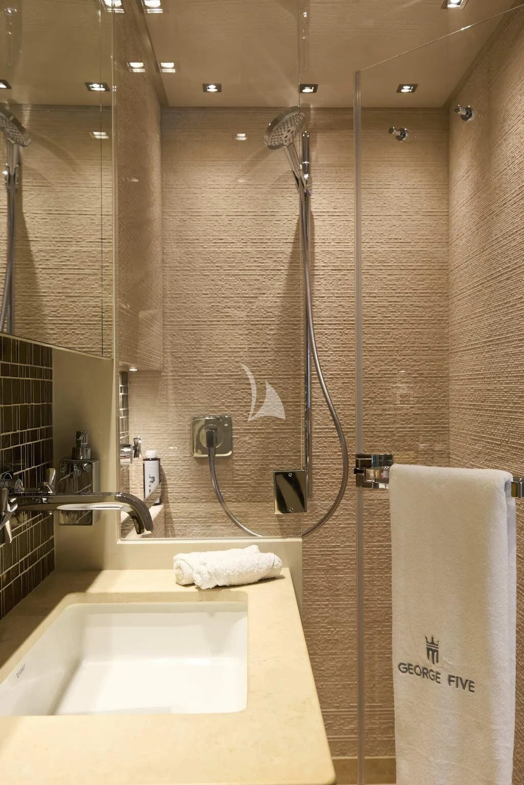 a bathroom with a shower and sink aboard DE ZEUS Yacht for Sale