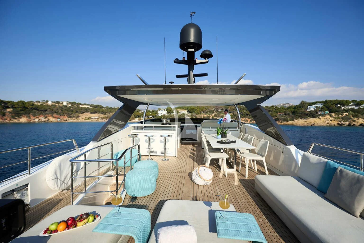 a deck with a large ship on it and a large building in the background aboard DE ZEUS Yacht for Sale