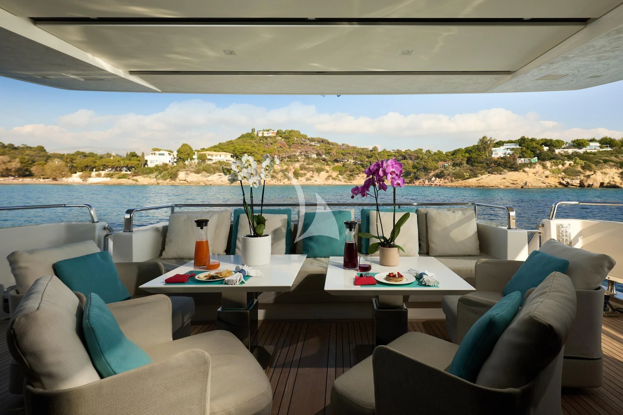 a room with a table and chairs aboard DE ZEUS Yacht for Sale
