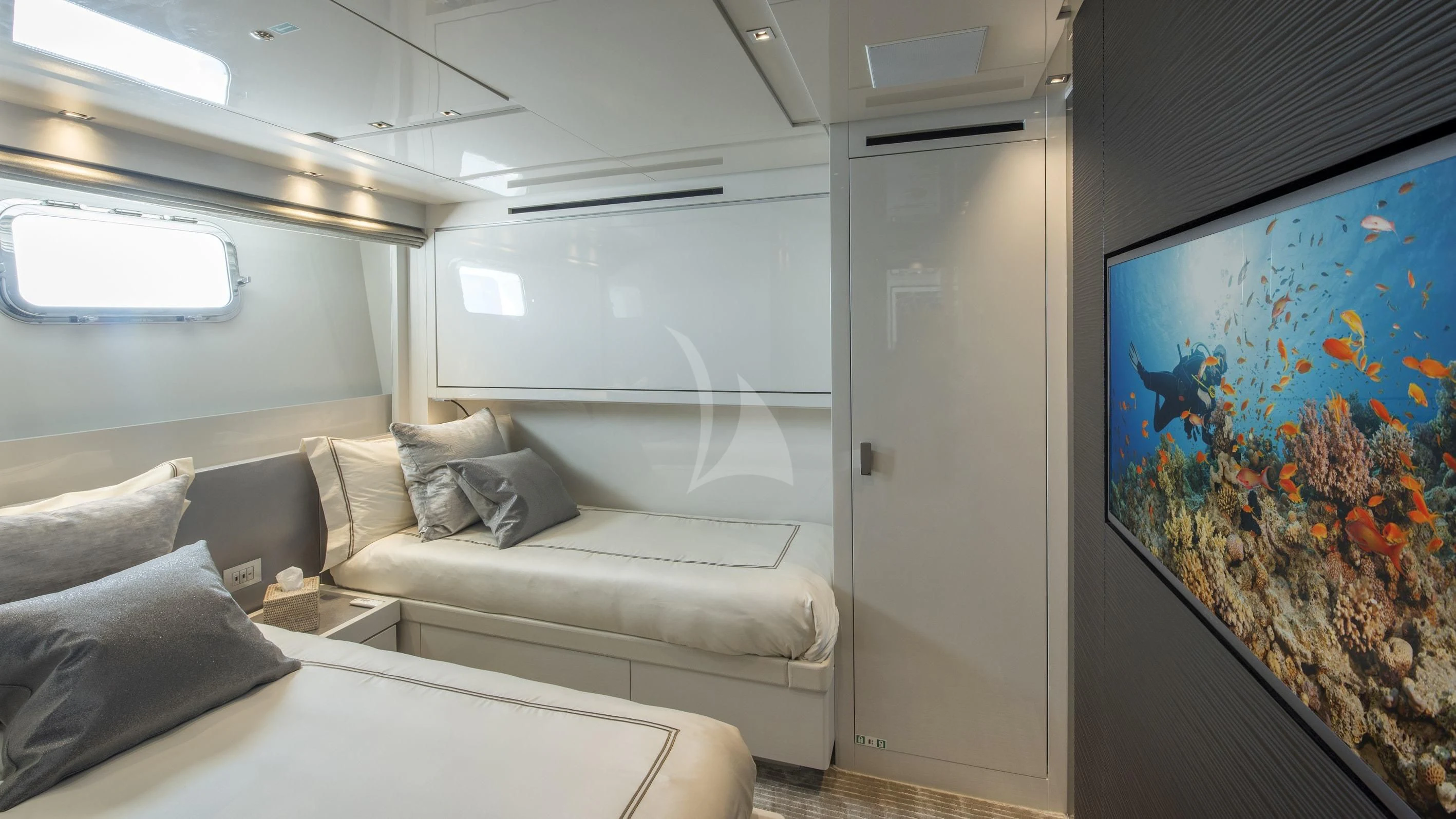 a room with a couch and a painting on the wall aboard DE ZEUS Yacht for Sale
