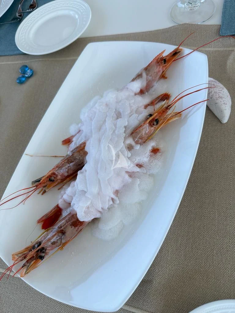 a plate with food on it aboard DE ZEUS Yacht for Sale
