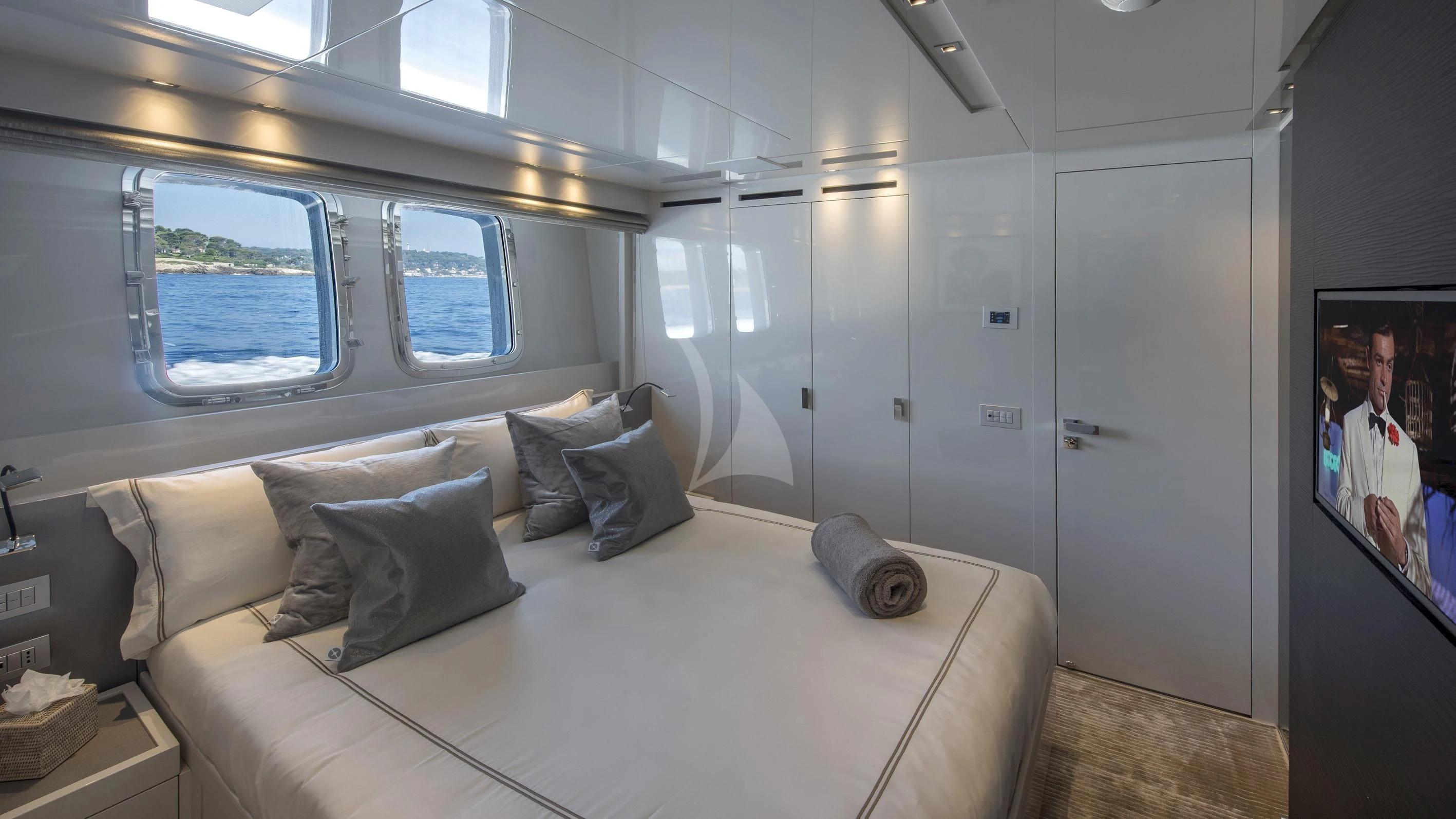 a white couch in a room aboard DE ZEUS Yacht for Sale