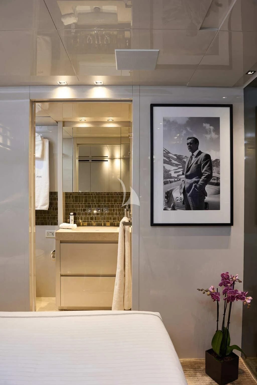 a bathroom with a mirror and a sink aboard DE ZEUS Yacht for Sale