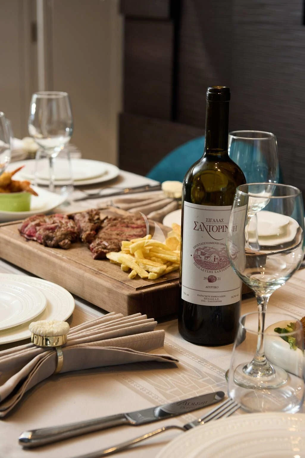 a table with food and wine aboard DE ZEUS Yacht for Sale