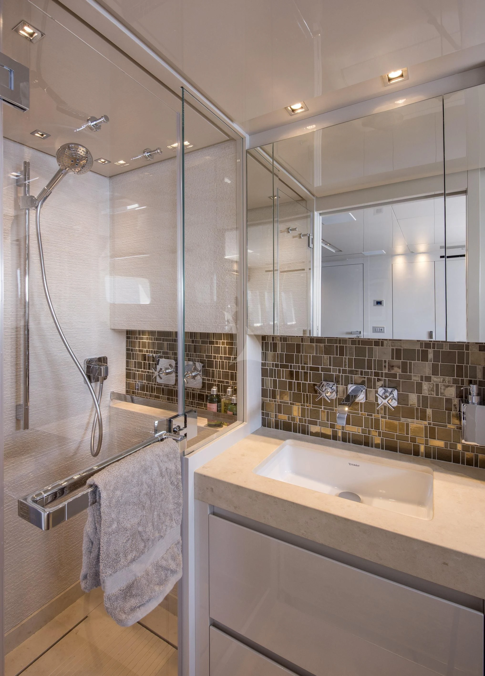 a bathroom with a shower and sink aboard DE ZEUS Yacht for Sale