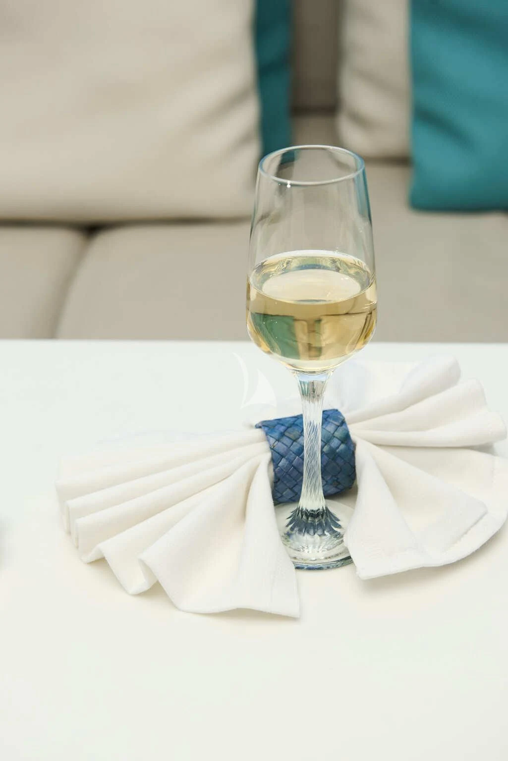 a glass of wine on a napkin aboard DE ZEUS Yacht for Sale