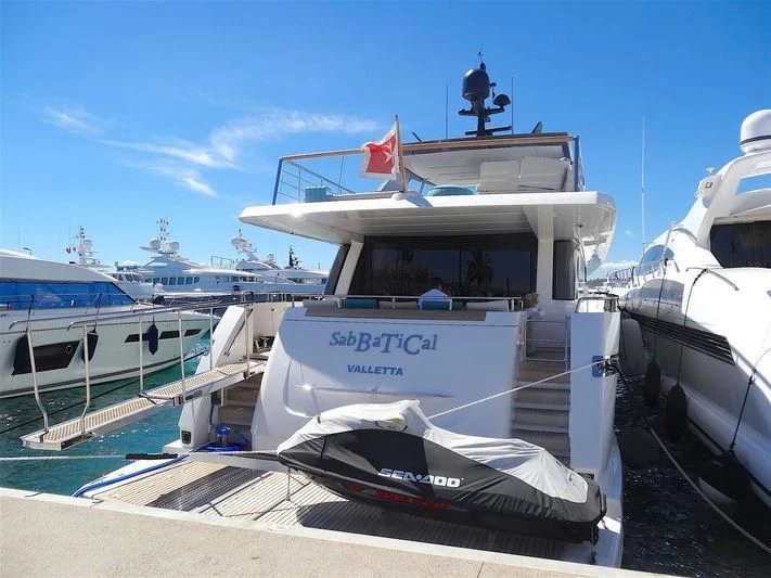 a boat docked at a pier aboard DE ZEUS Yacht for Sale
